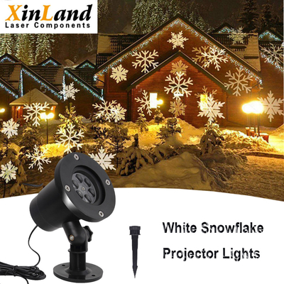 La Navidad móvil blanca del proyector LED de los copos de nieve 4.2W enciende la rotación